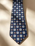 Corbata azul marino con mosaico en celeste