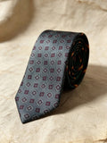 Corbata gris con mosaico granate