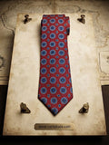 Corbata roja con mosaico azul